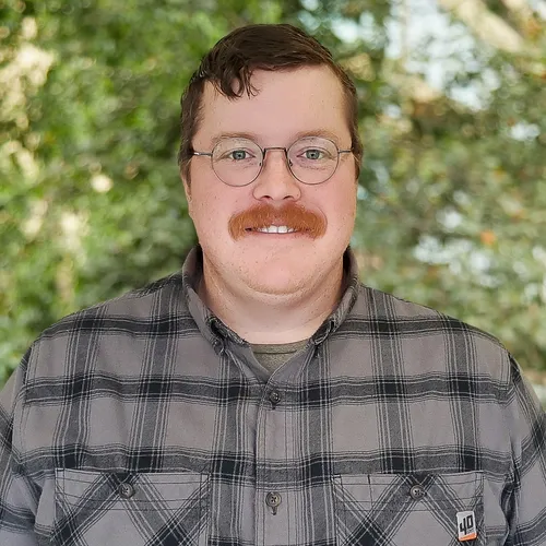 Headshot of SavATree Arborist Evan Ford